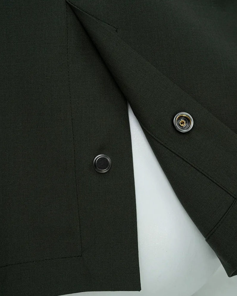 The Vanguard Jacket — dark olive field jacket, snap and pocket detail