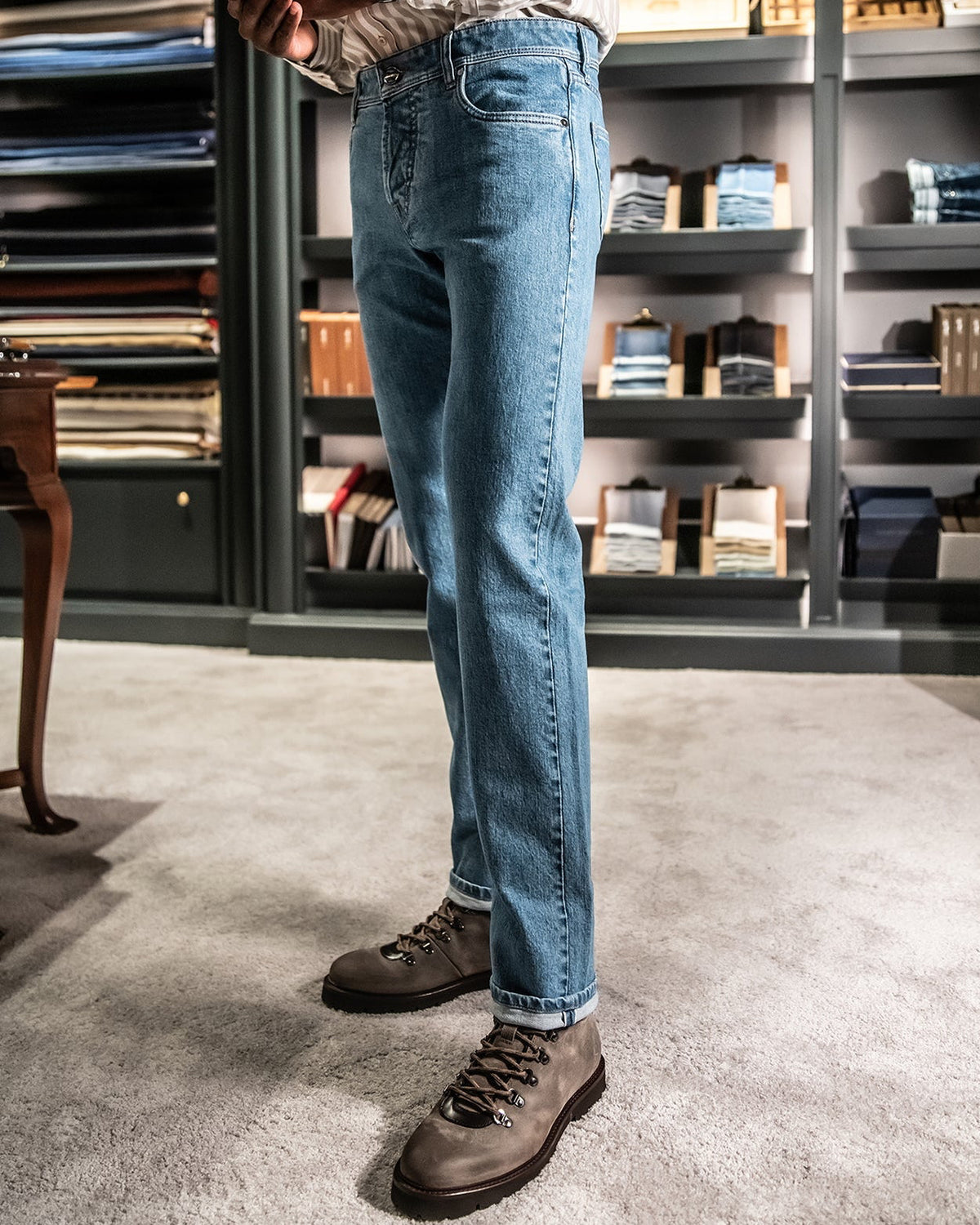 The Landmark Selvedge — blue denim, side view of jeans worn with boots