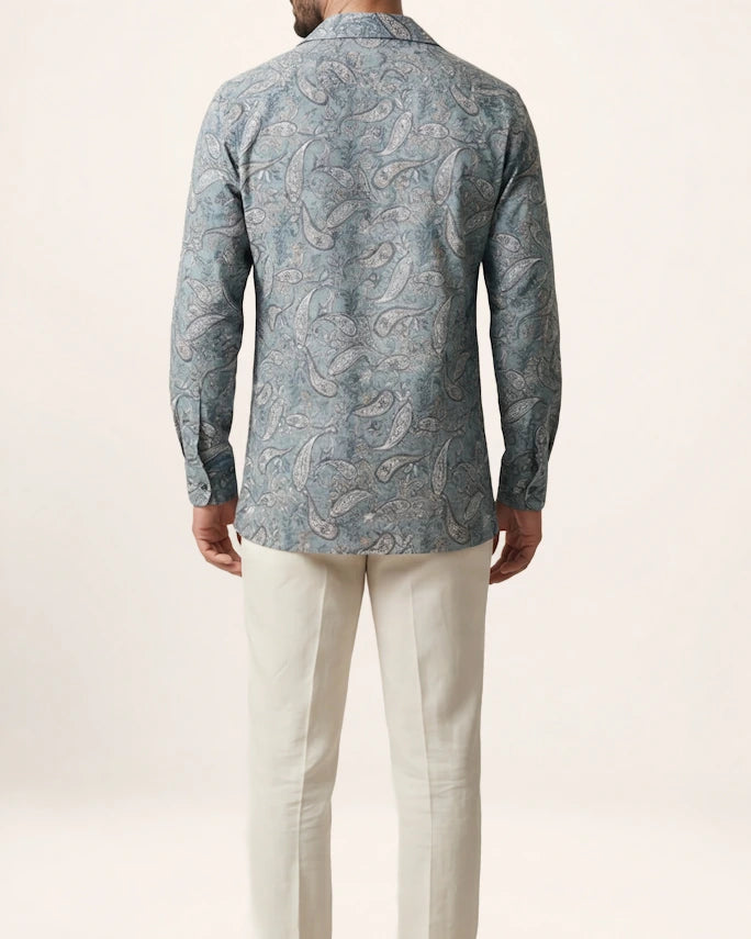 The Mirage Shirt — blue paisley shirt, back view on a model