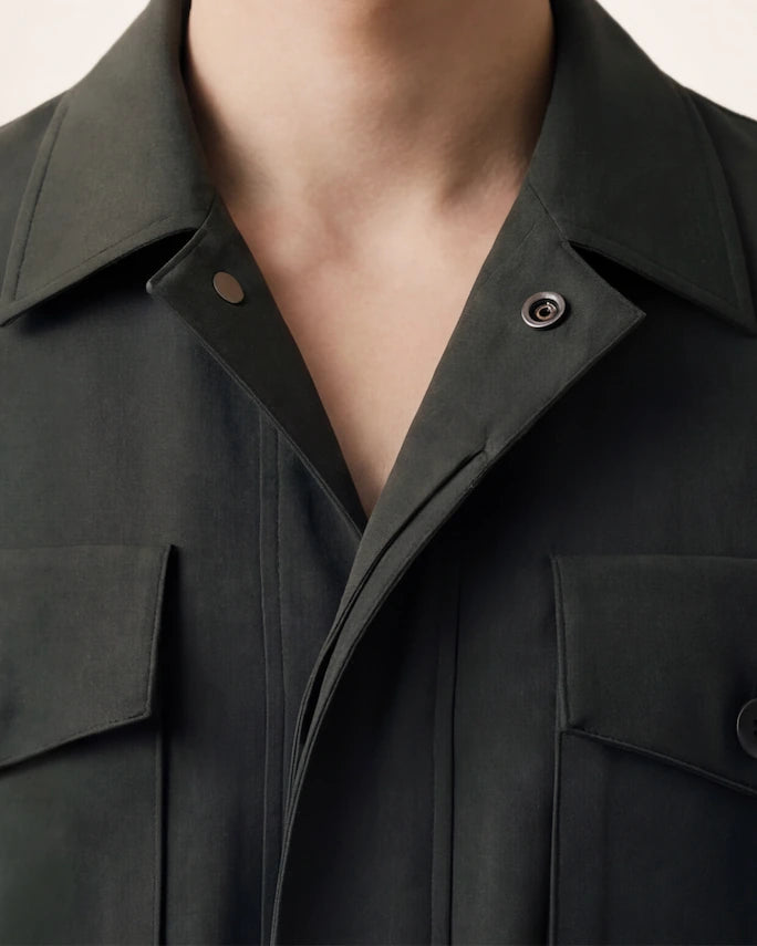 The Vanguard Jacket — dark olive field jacket, collar and chest pocket detail