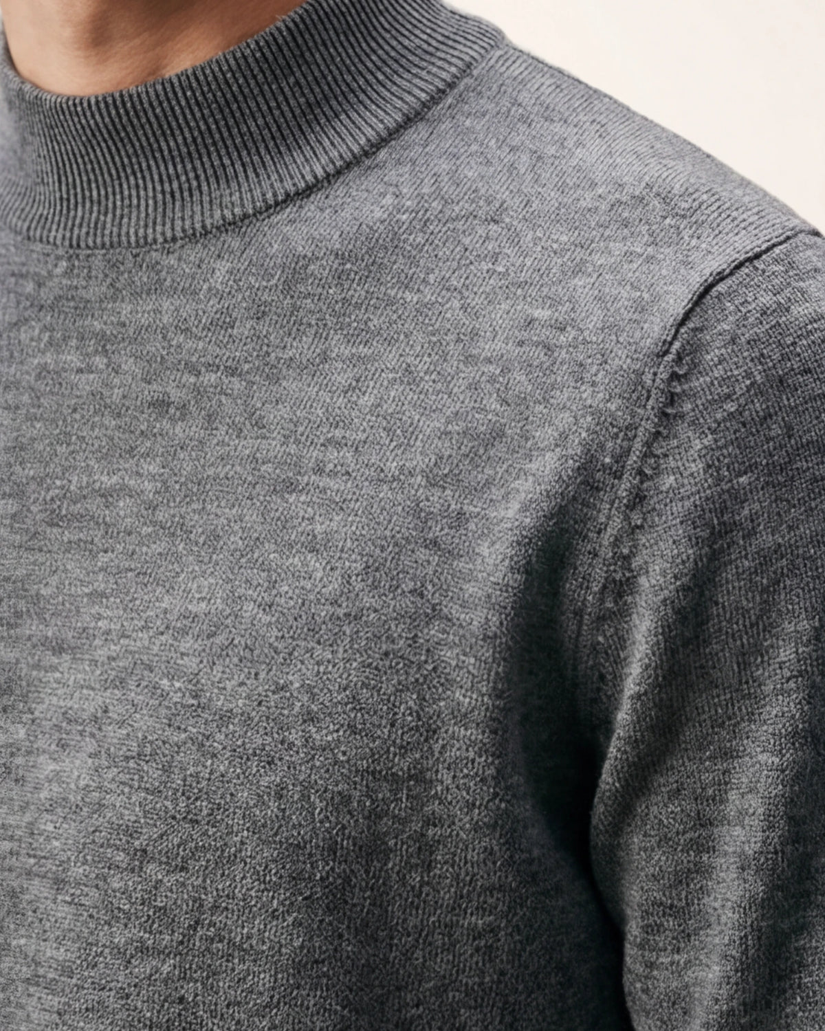The Voyager Knit — grey crew-neck knit, ribbed collar detail