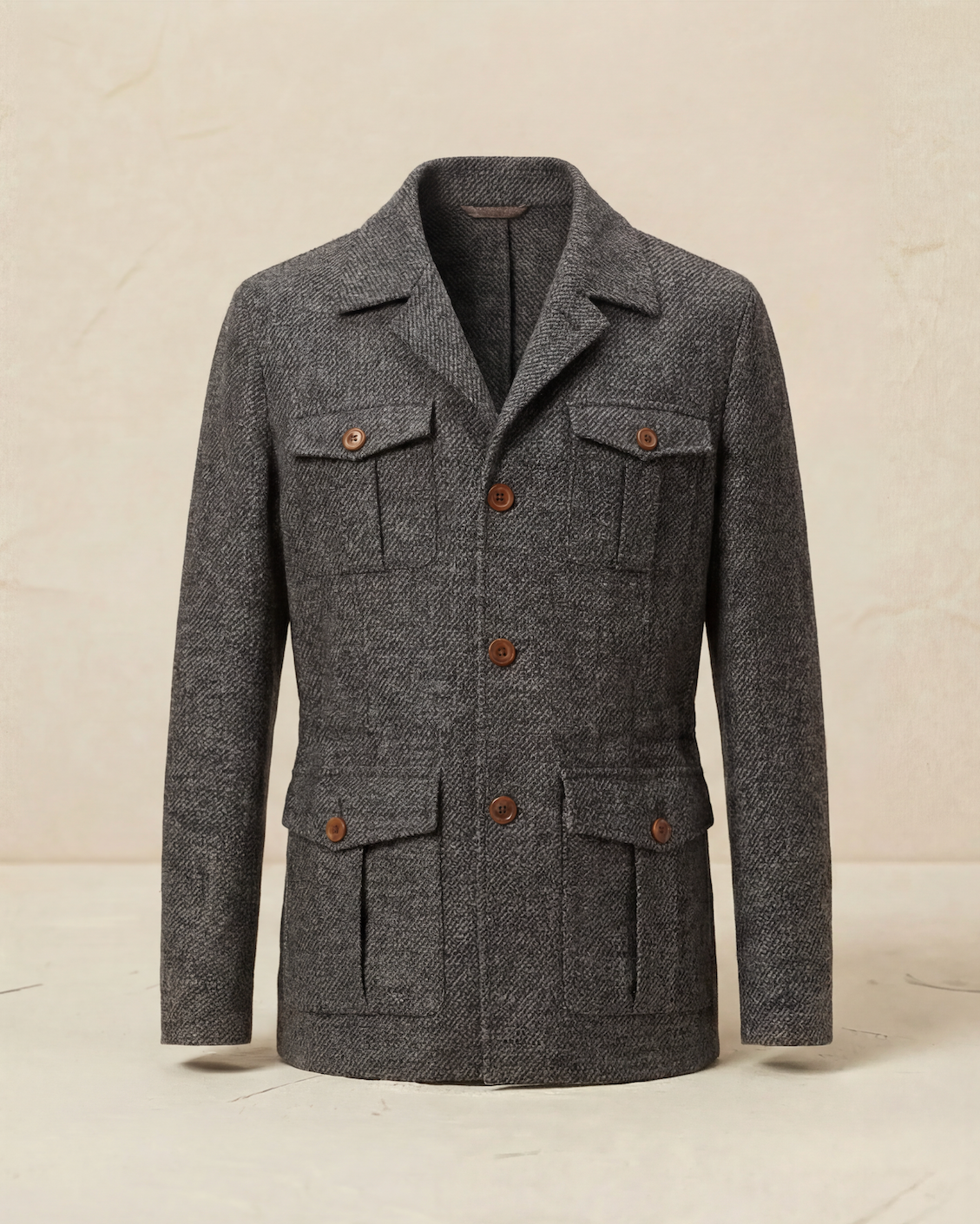Gray textured coat with button details on a light beige background