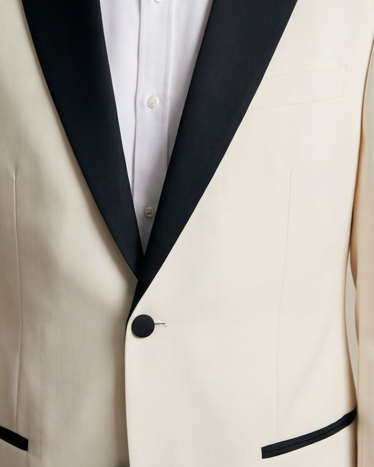 The Ascension Suit — ivory suit with black trim, black lapel and pocket trim detail