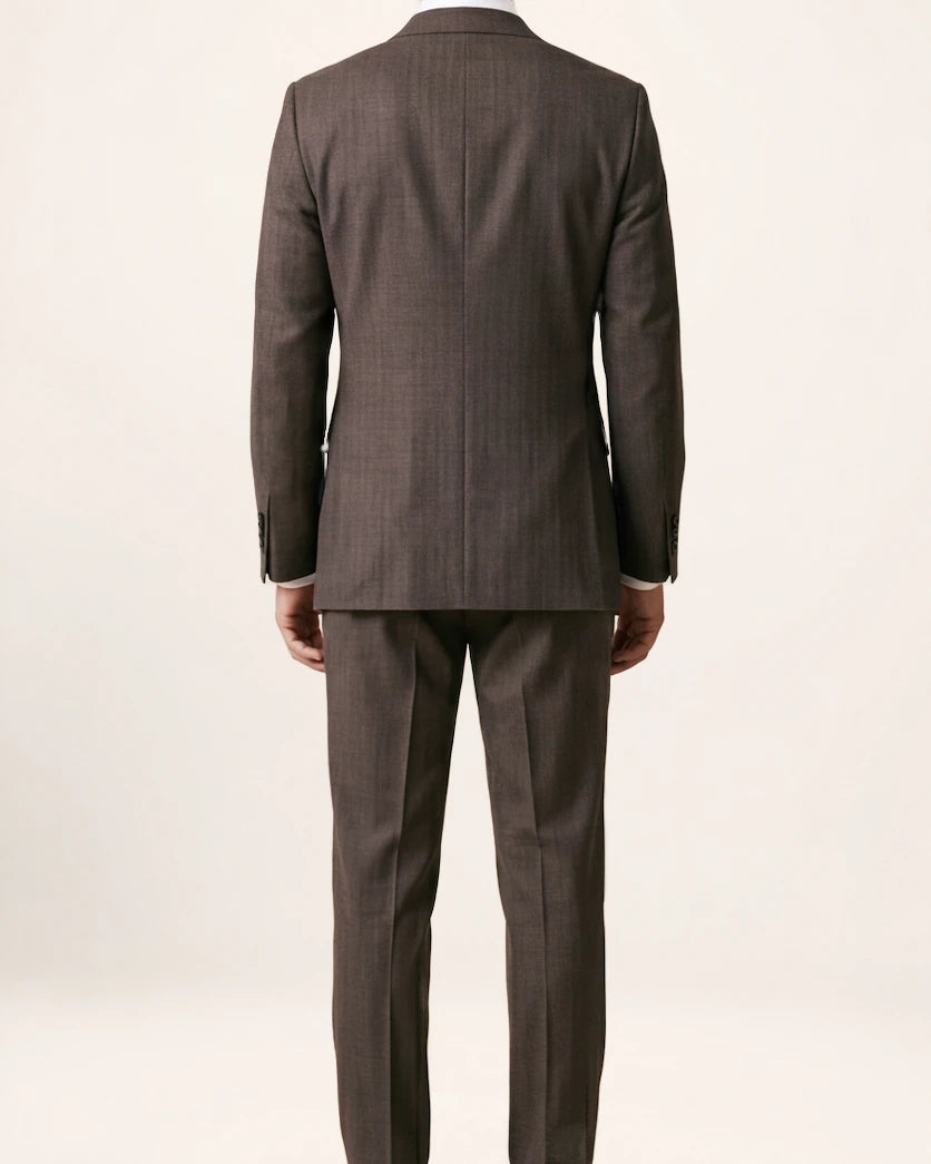 The Apex Suit — brown suit, back view on a model
