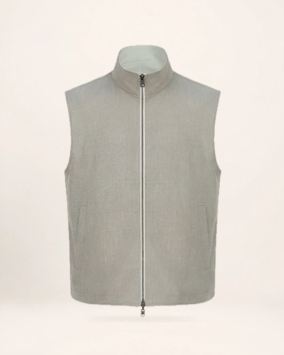 The Ascent Vest — grey-beige zip vest, front view