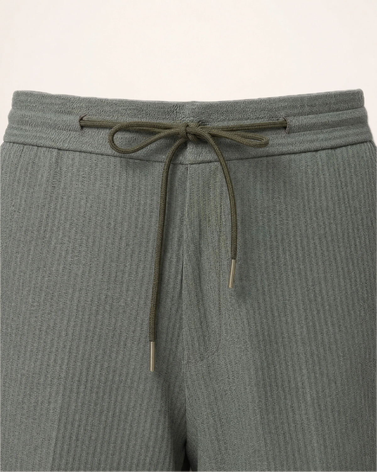 The Dune Short — grey-green shorts, drawstring waist detail