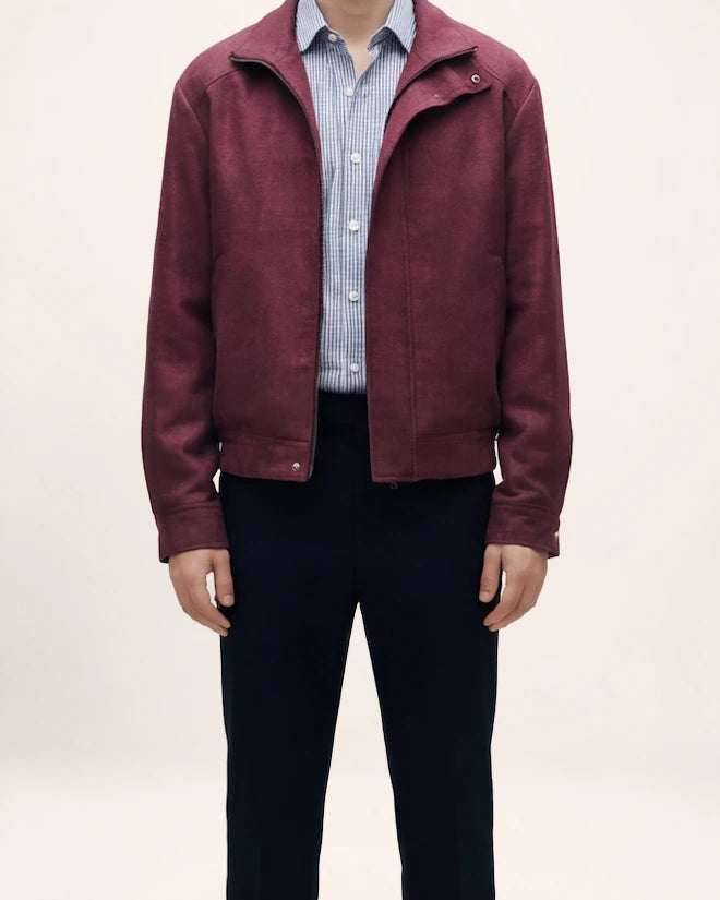 The Ember Jacket — burgundy jacket, front view on a model