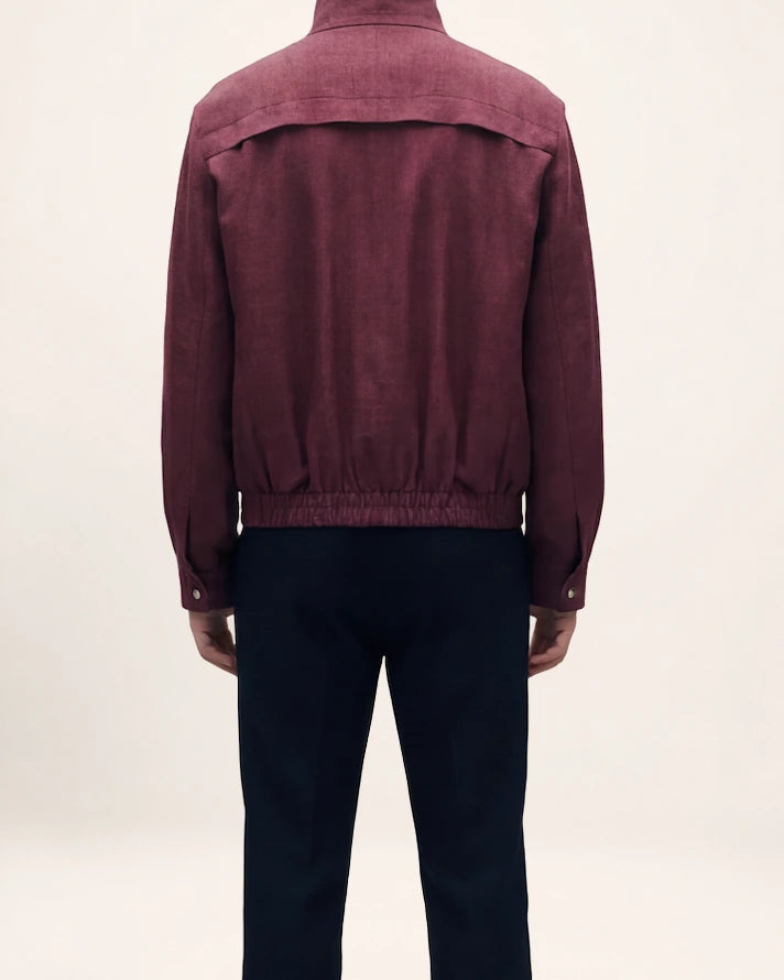 The Ember Jacket — burgundy jacket, back view on a model