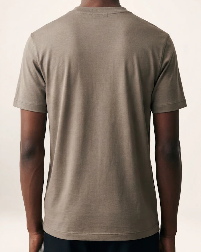 The Essential Knit — taupe short-sleeve crew-neck knit, back view on a model