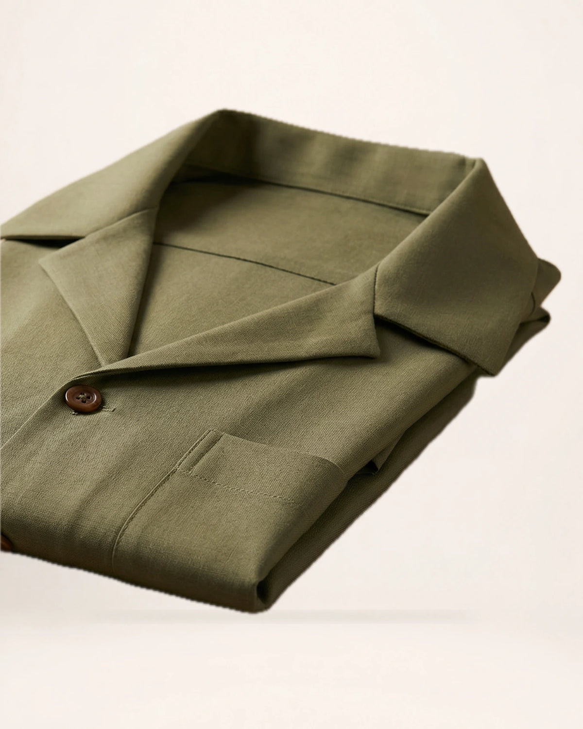The Horizon Shirt — olive short-sleeve shirt, folded shirt