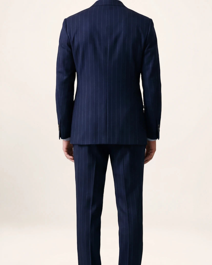 The Power Suit — navy pinstripe suit, back view on a model