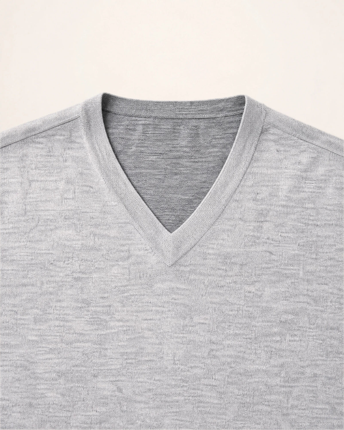 The Refined Knit — light grey V-neck knit, V-neck and texture detail