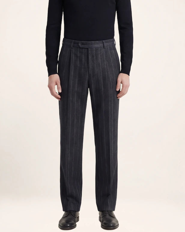The Resolve Trouser — charcoal striped trousers, front view on a model