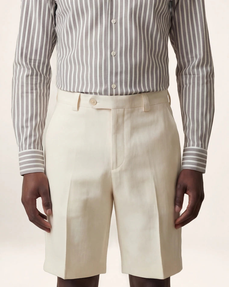 The Trail Short — ivory shorts, front view on a model