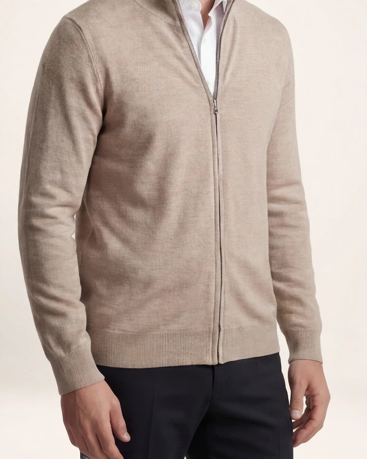 The Transit Knit — oatmeal zip knit, front view on a model
