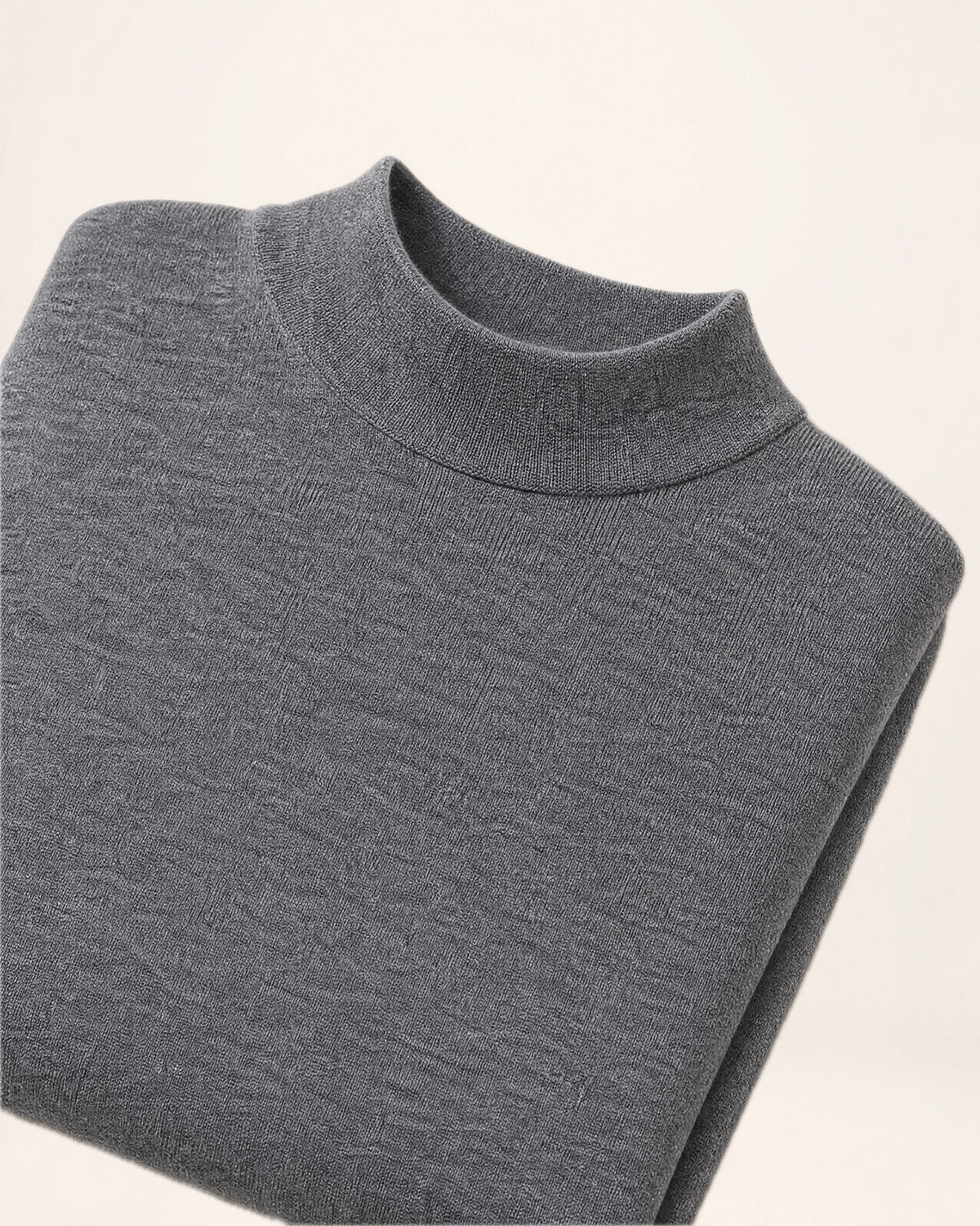The Voyager Knit — grey crew-neck knit, folded knit with ribbed collar