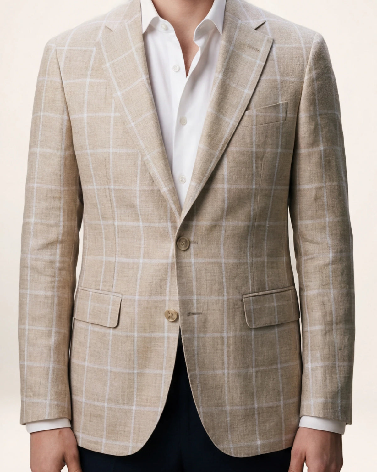 The Waypoint Jacket — beige checked jacket, front view on a model