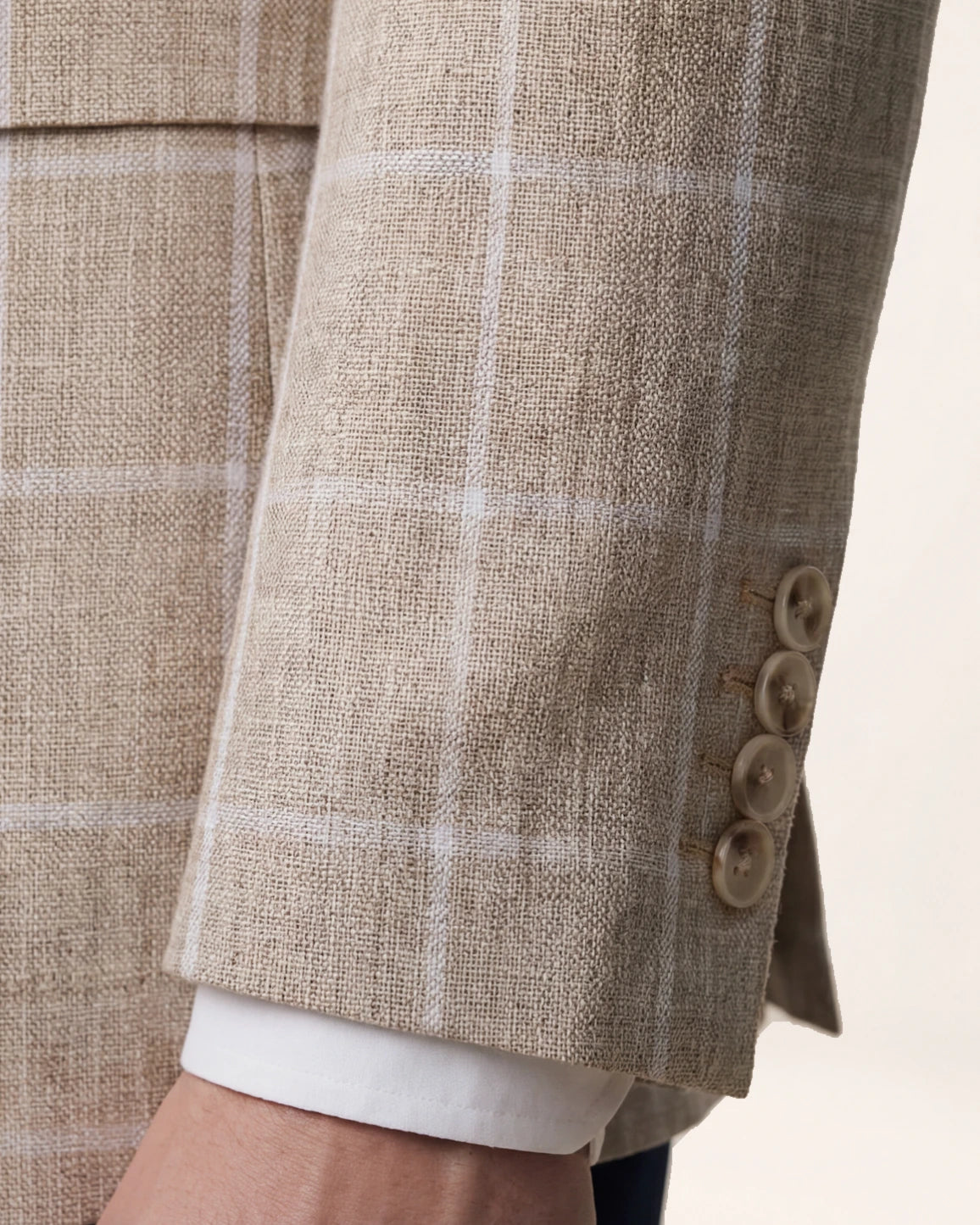 The Waypoint Jacket — beige checked jacket, cuff and sleeve button detail